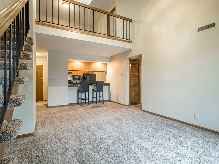 Our loft-style homes feature a spacious two-story layout that gives you room to spread out and make each area feel like your own.