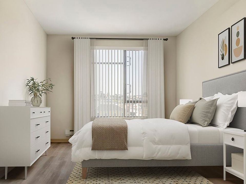 Updated Finishes bedroom with hard surface flooring