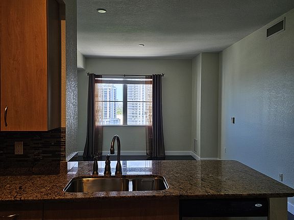 Kitchen overlooking living/dining room.