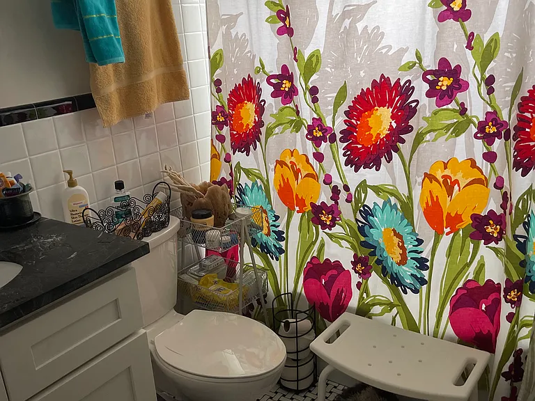 Private tenant bath with tub and shower