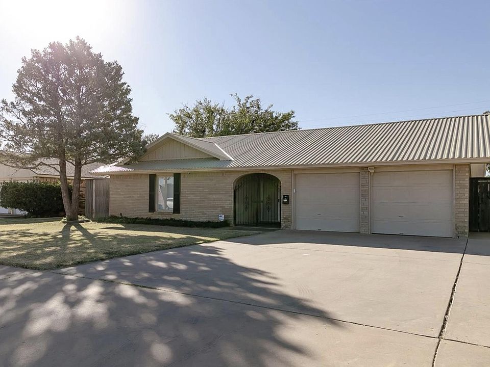 Front with extra parking and garage parking