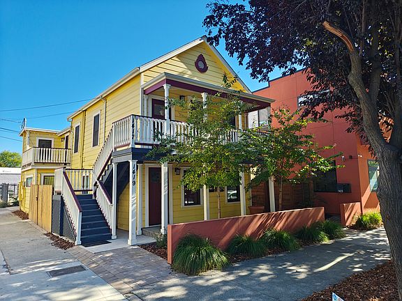 The house sits at the corner of 20th St and Neighbors Alley.