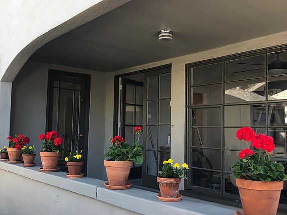 The long front porch - covered and perfect for lounging or outside dining