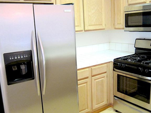 Kitchen with new stainless steel appliances