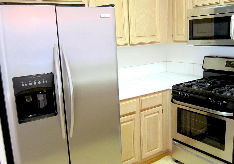 Kitchen with new stainless steel appliances
