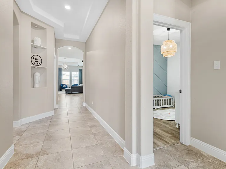 Entry with secondary bedrooms to the right