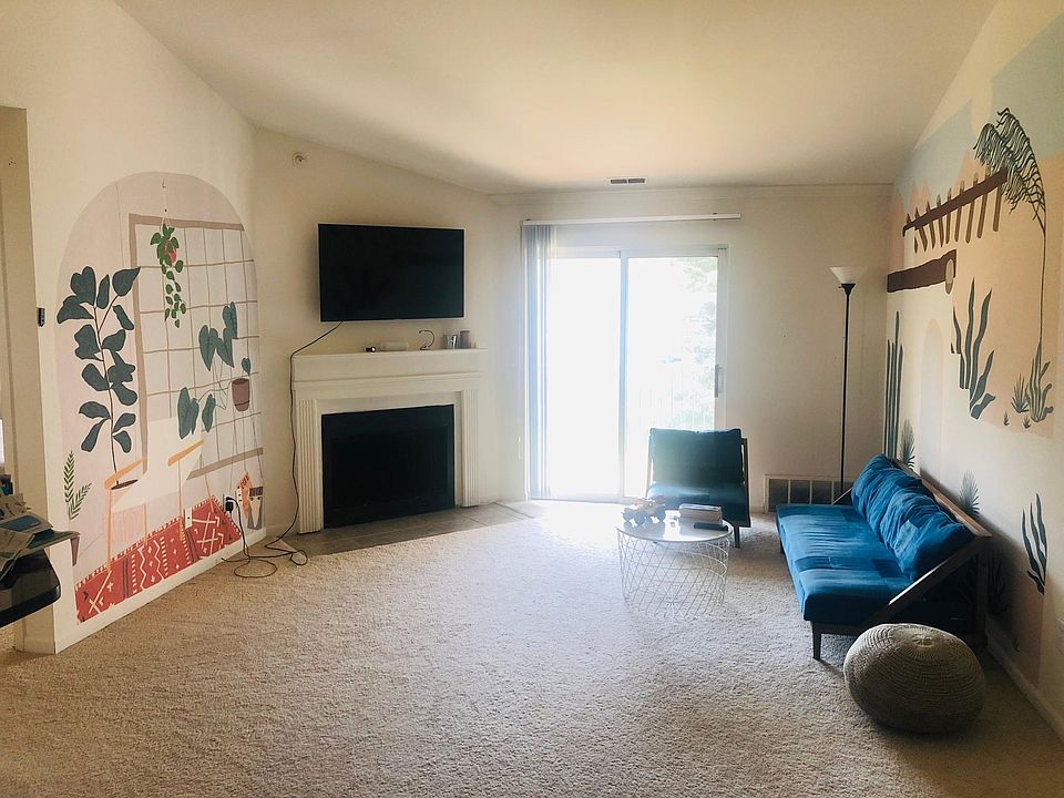 Spacious Living Room with Fireplace - you get to keep the beautiful wallpaper on the side walls