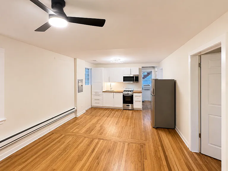 wide angle view of the brand-new kitchen from the living area