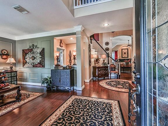 Your Friends & Family will be impressed by  Hardwood Flooring, High Ceilings, Updated Lighting, Art Niches, & Dbl Crown Molding.