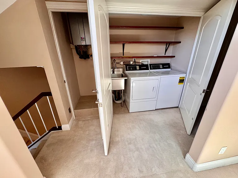 Upper Level Laundry / Utility Sink / Storage Closet