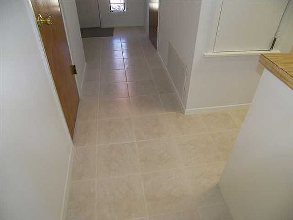 New tile floors in kitchen and halls