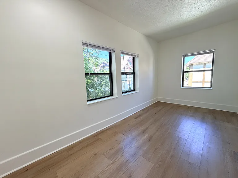 Dining room with lots of South facing sunshine. Great for a dining room or office.