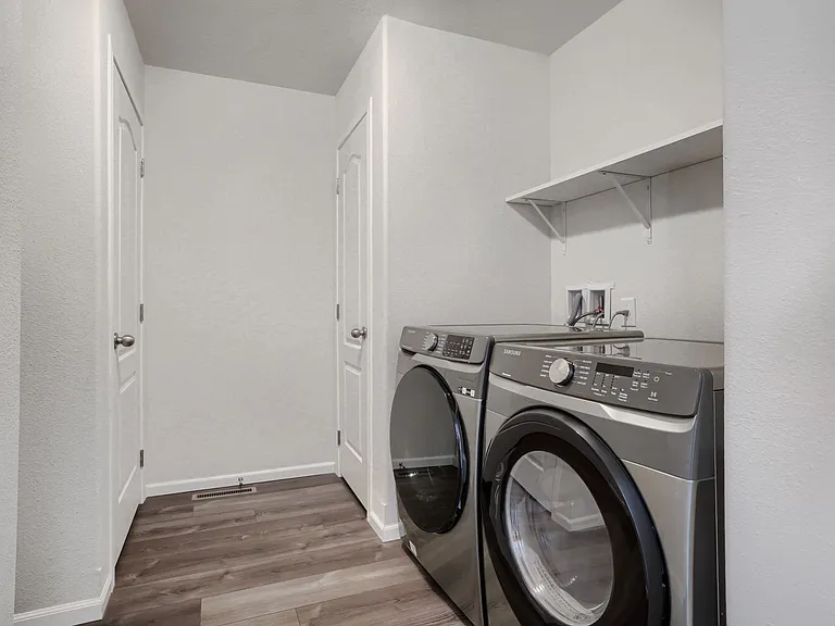 Laundry room. Includes washer and dryer