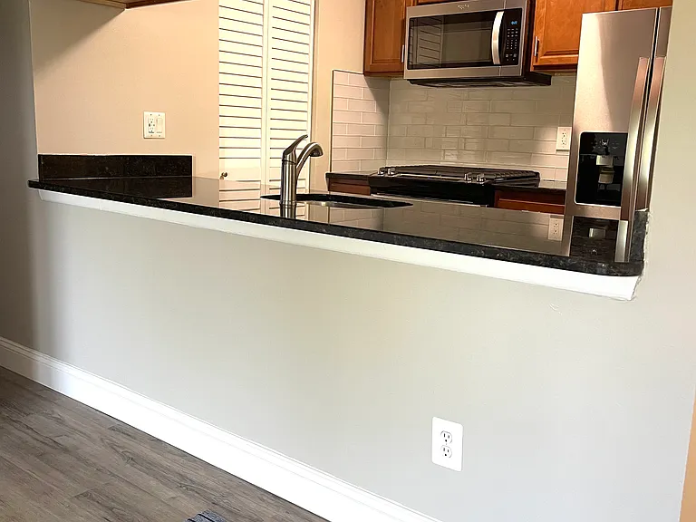 Galley Kitchen with newer appliances