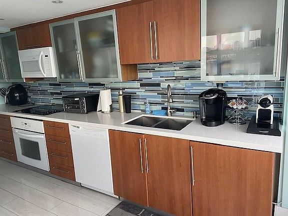 5th image of 900 Bay Dr APT 402