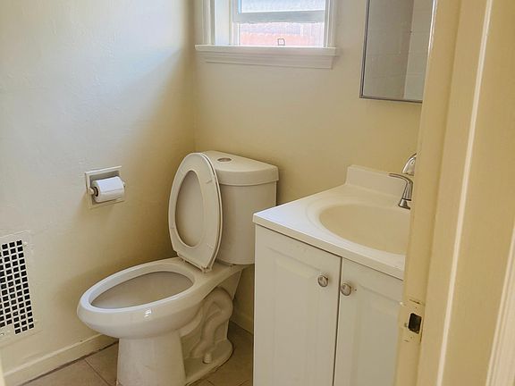 One bath new cabinet, faucet and paint