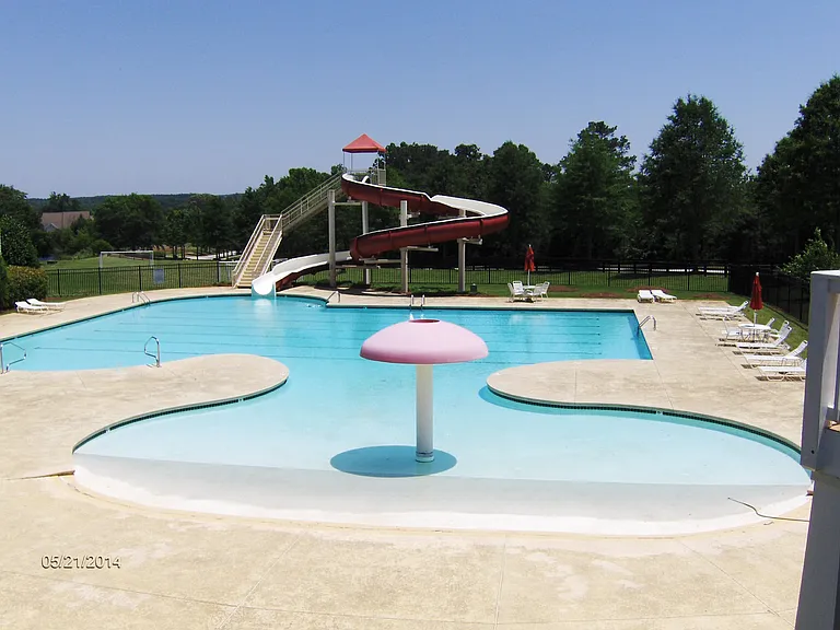 Pool with slide and kids shallow area
