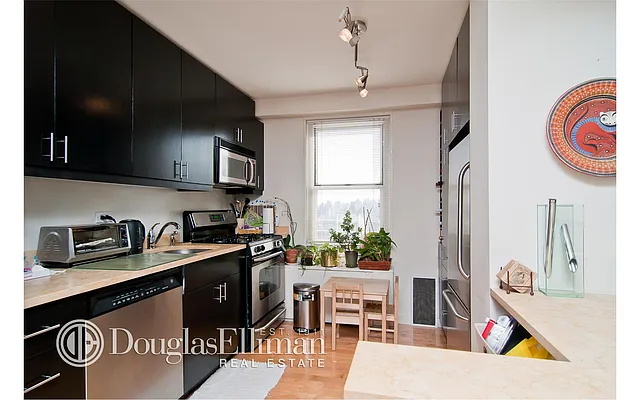Sold by Douglas Elliman | media 12