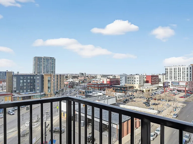 Take in beautiful mountain and city views from your private patio.