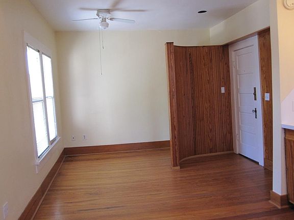 Sleeping area partially shielded by semi-circular entry area