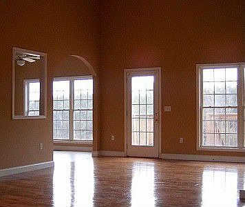 open floor plan, numerous windows, 15ft ceiling