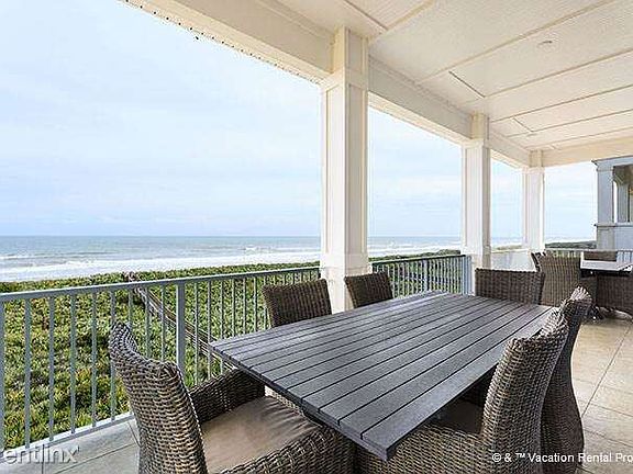 The huge 3rd-floor balcony offers ocean views and seats 12!