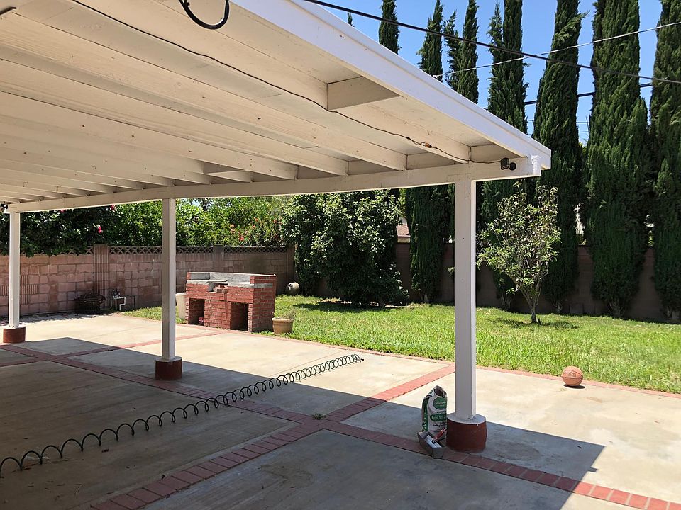 Big beautiful backyard with a side storage 