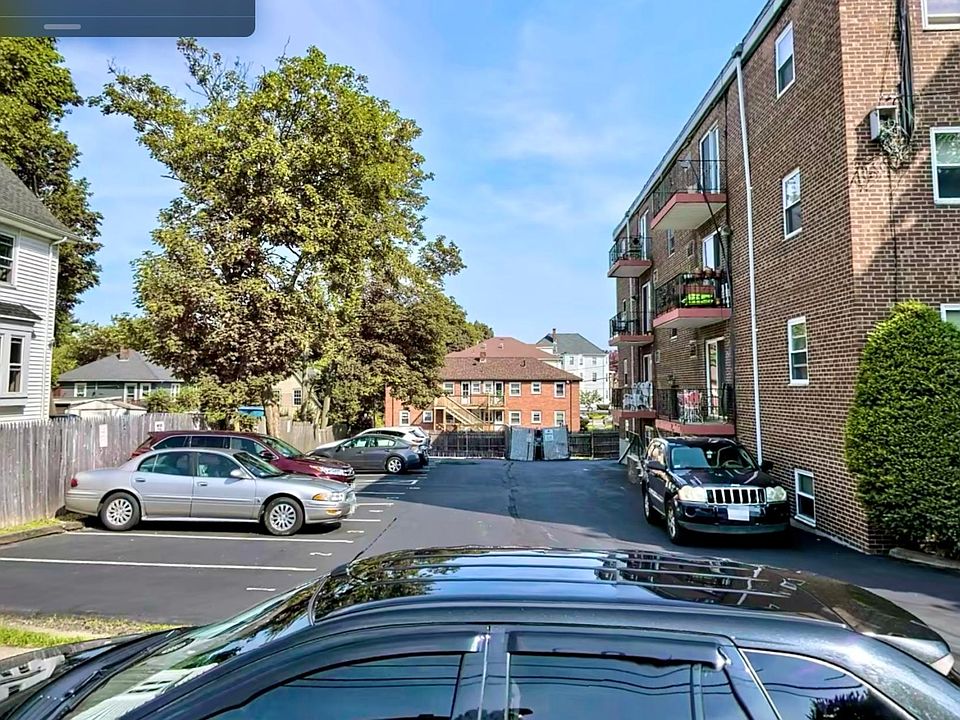 Assigned parking for tenants behind building.