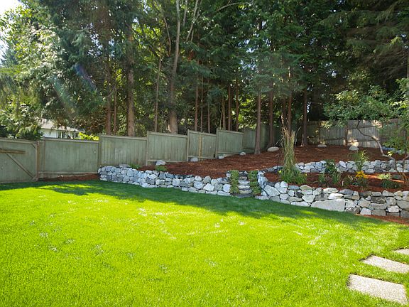 New lawn, pavers, stone.