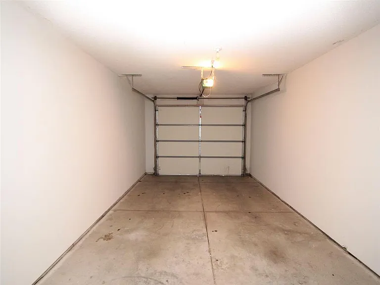 Many homes include an attached garage, offering covered parking and extra storage space.
