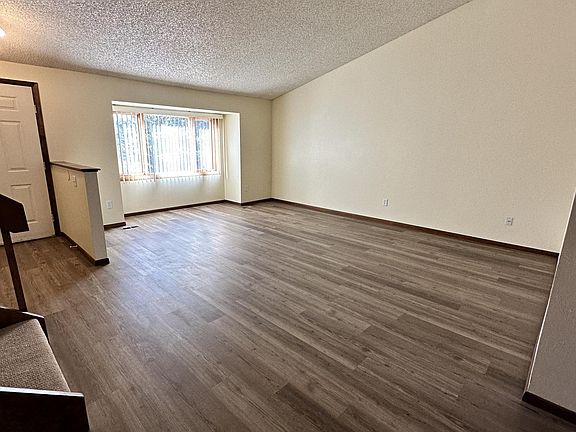 Main floor living room from dining area