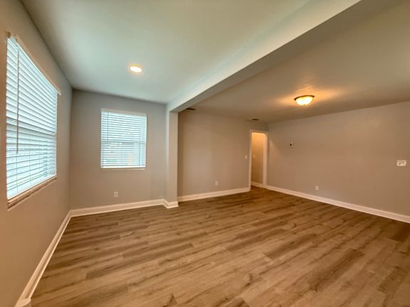 Large living room with great natural lighting.