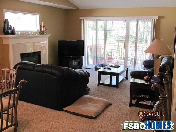 Living room with slider to Deck