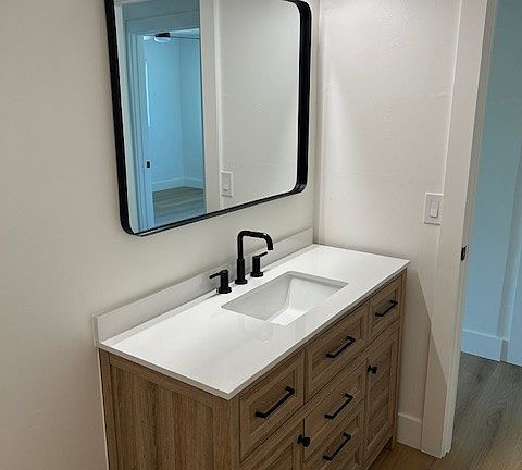 Vanity and door to Hallway