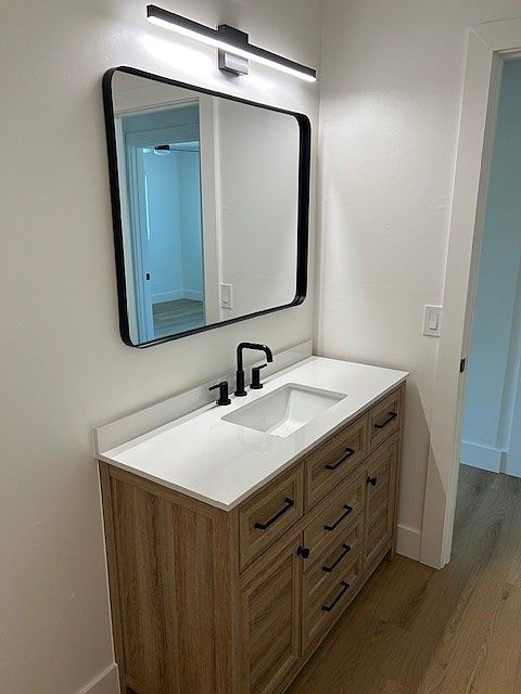 Vanity and door to Hallway