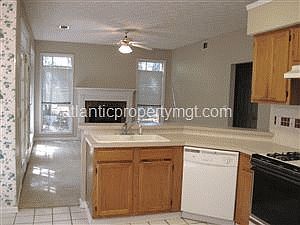 kitchen overlooks great room!