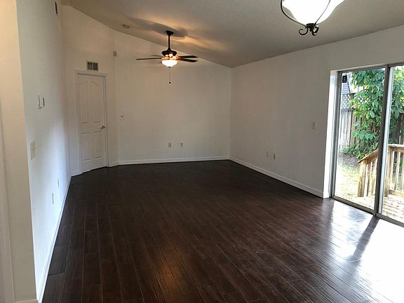 open floor plan; living room and dining room.