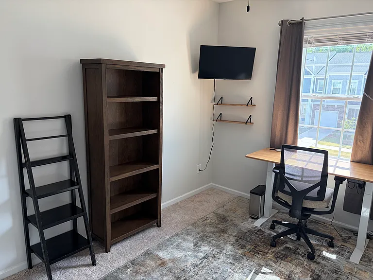 Furnished third bedroom as office or flex room.