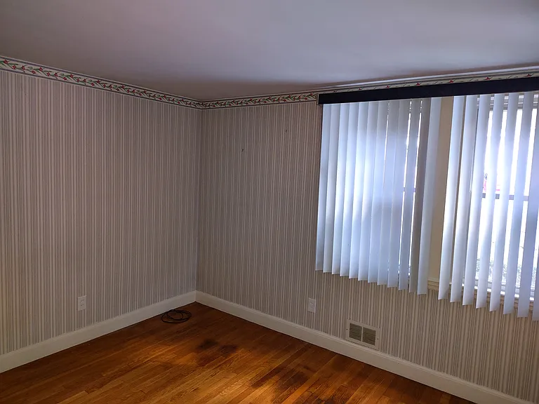Front room, potential additional bedroom with closet, but no door.