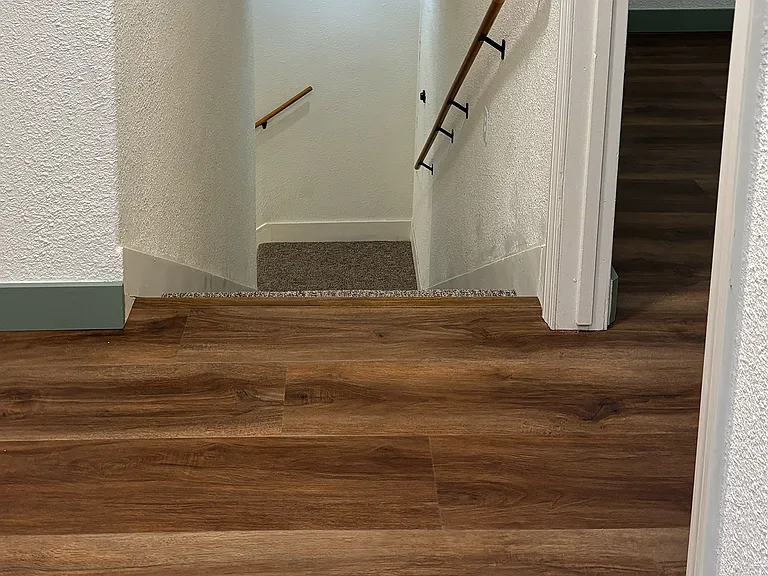 Stairway down to corner landing.