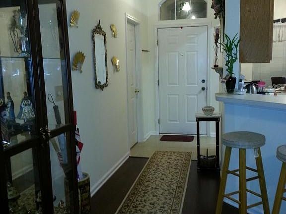 Foyer overlooking main door view 2