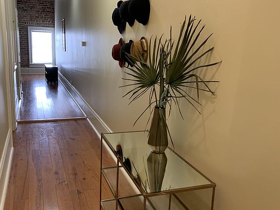 Entry hallway for transitioning from work to home and ready for a relaxing evening in this apartment