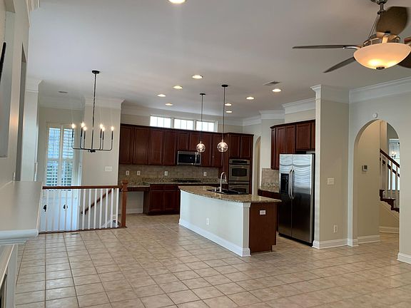 Open kitchen, eating nook, and family room.