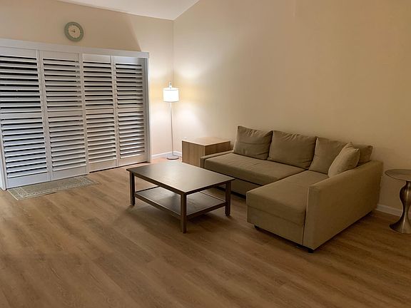 High Ceiling Living Room. Less than 3 years old luxury vinyl flooring throughout the unit.