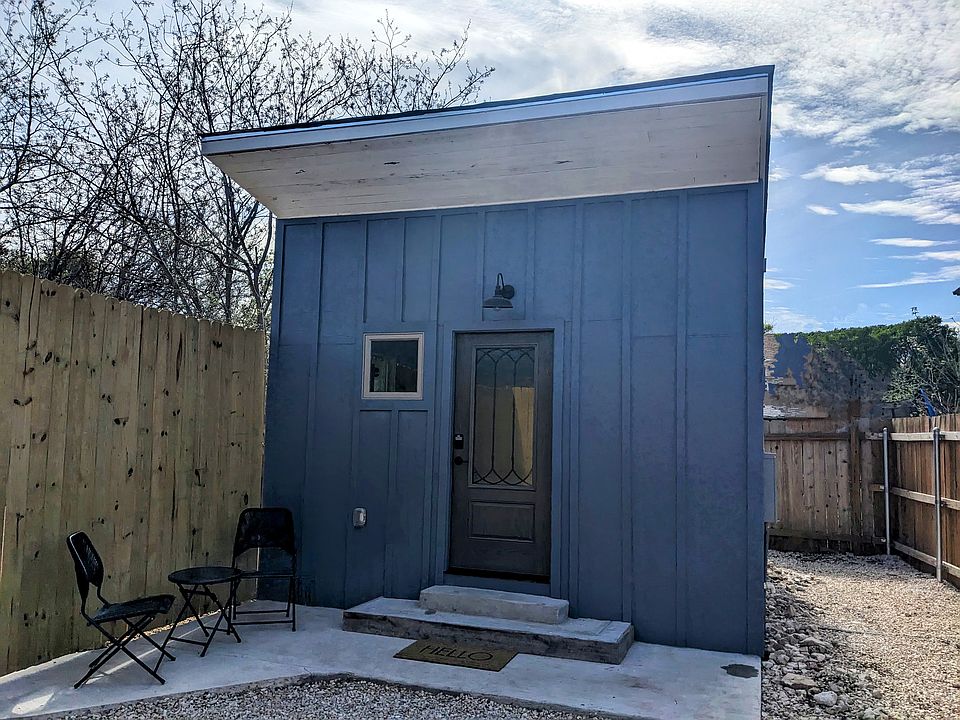 Completely private tiny home with front patio and bistro table set.