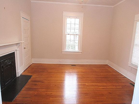 One of 4 rooms with decorative fireplaces