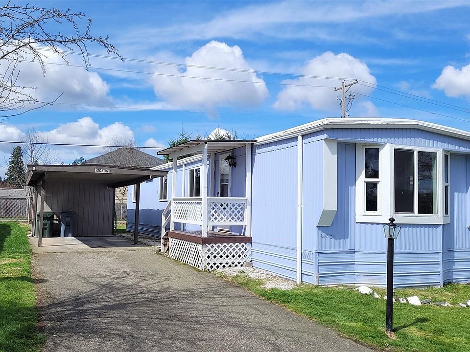 Home with shed and carport and small yard>