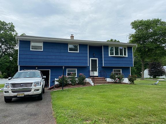 Front of house plus driveway