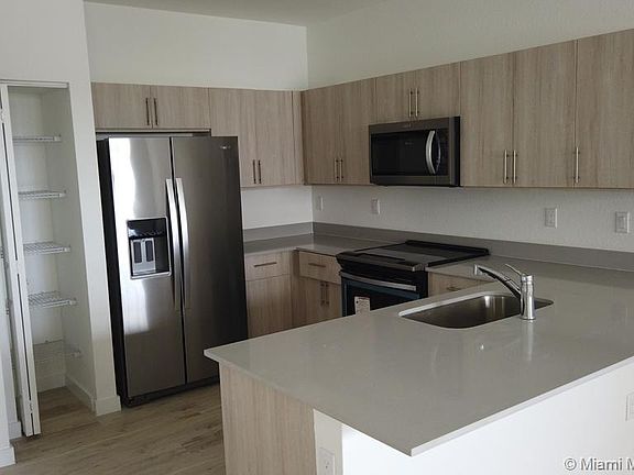 4th image of 15650 SW 136th St #1-212