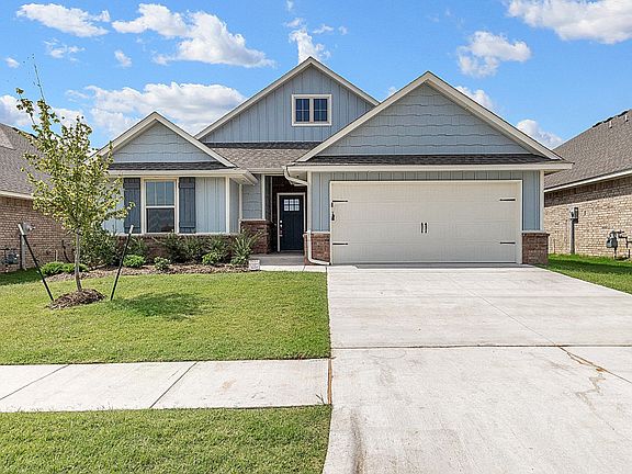 Homes by Taber Kamber B Elevation - 9125 NW 119th